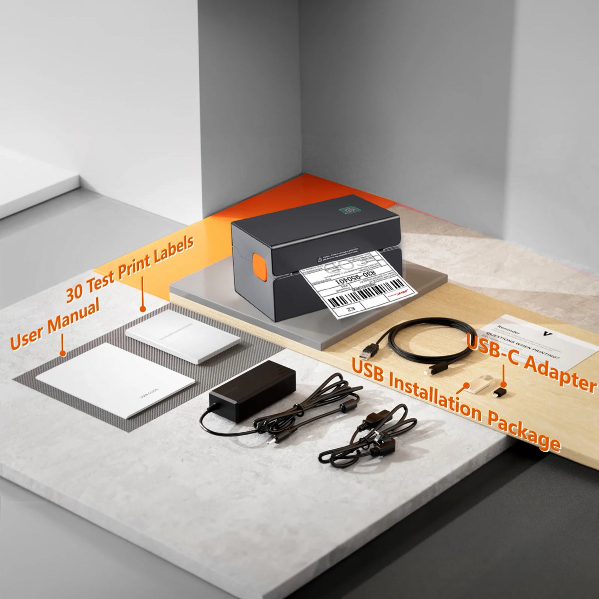 Contenu de la boîte : imprimante, 30 étiquettes de test, adaptateur secteur, câble USB et notice