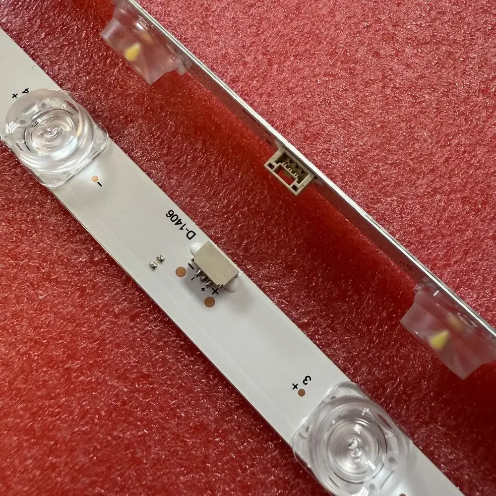 Gros plan sur les lentilles LED et le connecteur de la barre